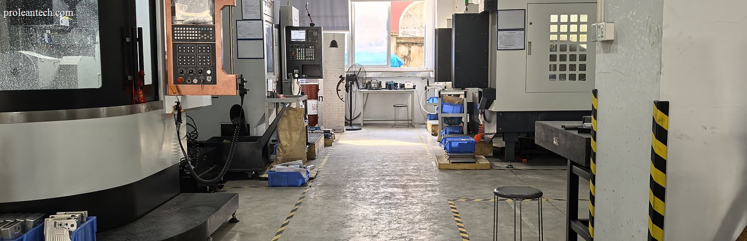 Aisle of CNC machining centres inside the Proleantech workshop in Baoan District, Shenzhen