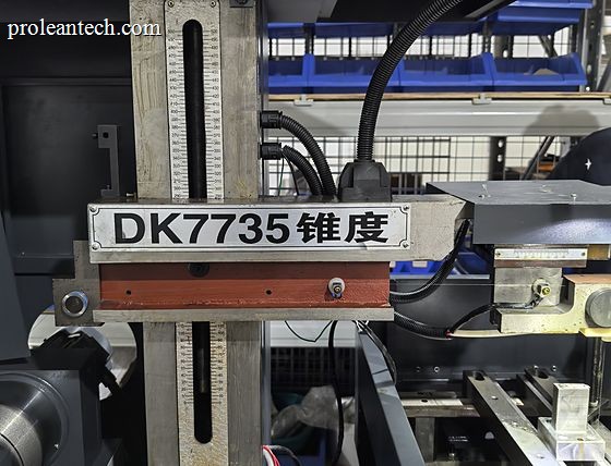 The DK7735 wire electrical discharge machine, with its nameplate visible