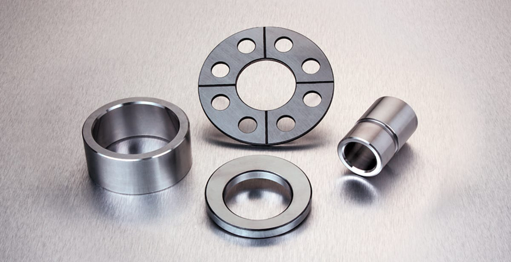 A display of CNC milled parts in factory setting.