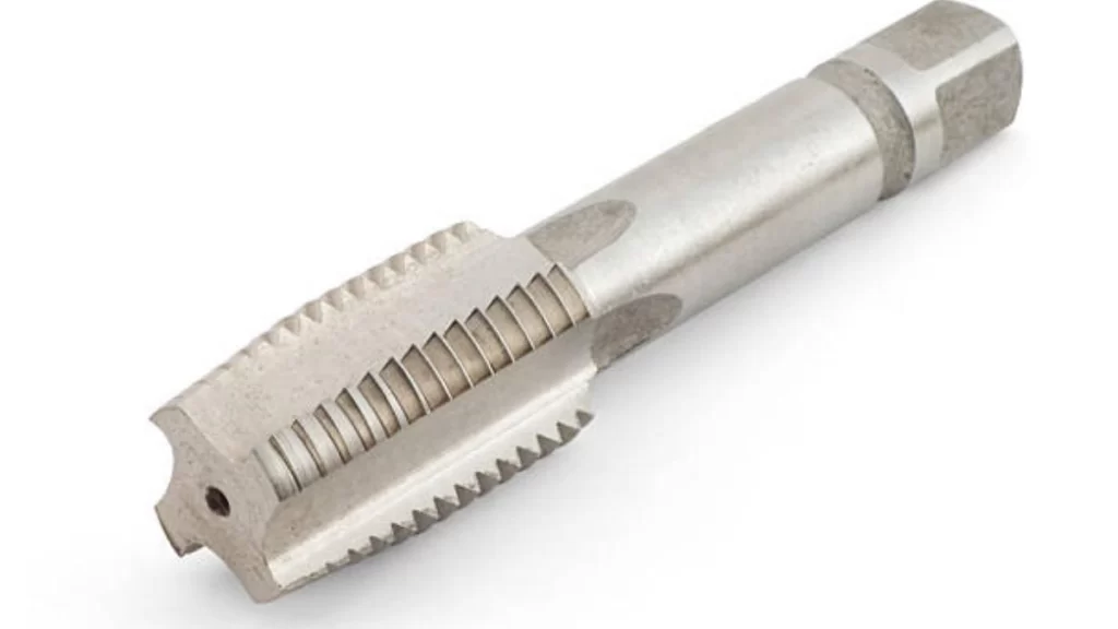A close look at a bottoming tap. It shows its threads and design in detail.
