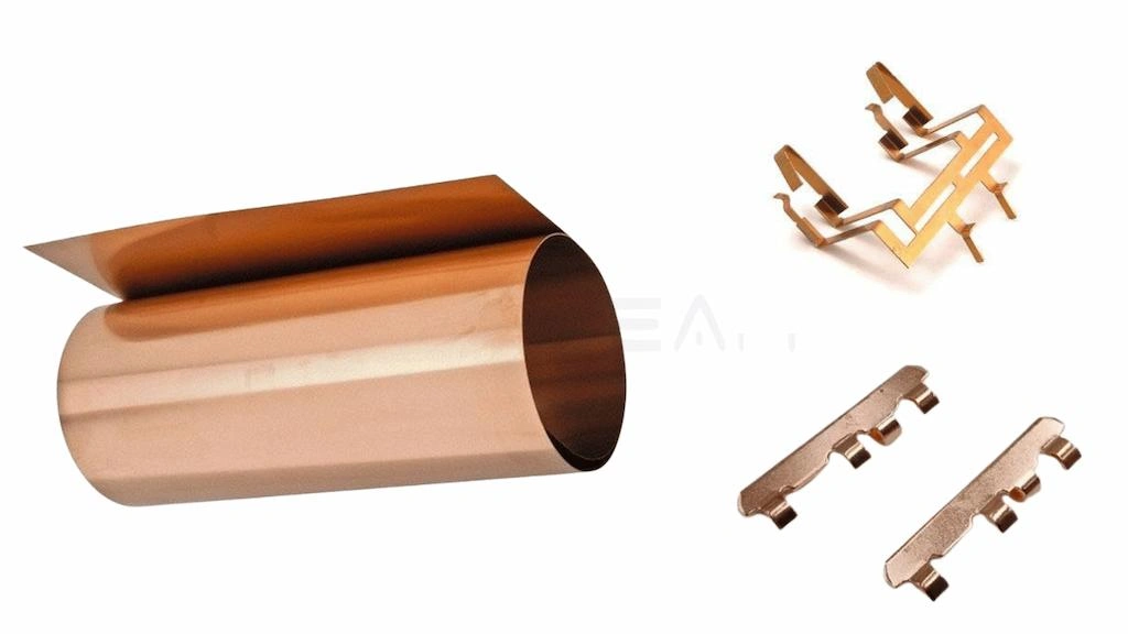 A coil of bronze metal sheet and stamping parts side by side