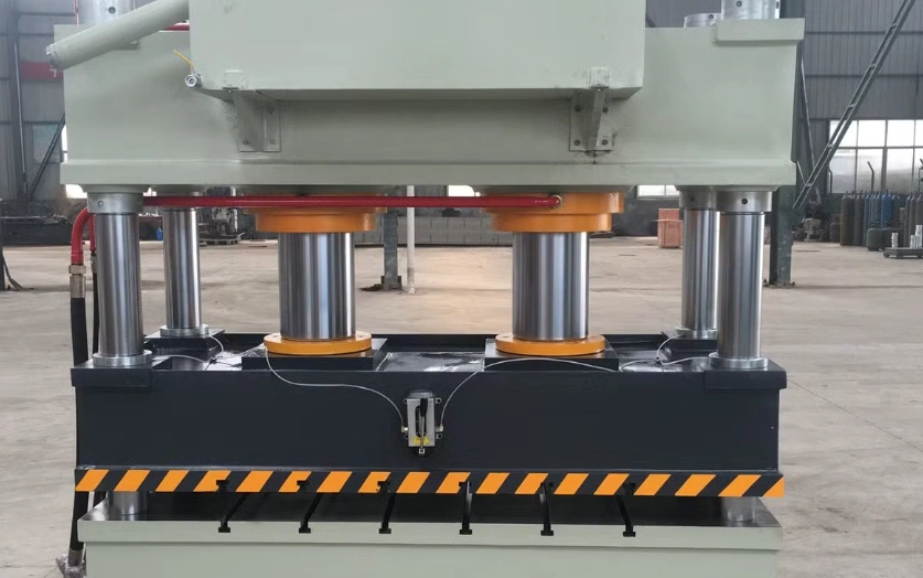 Hydraulic stamping press with multiple ram configuration