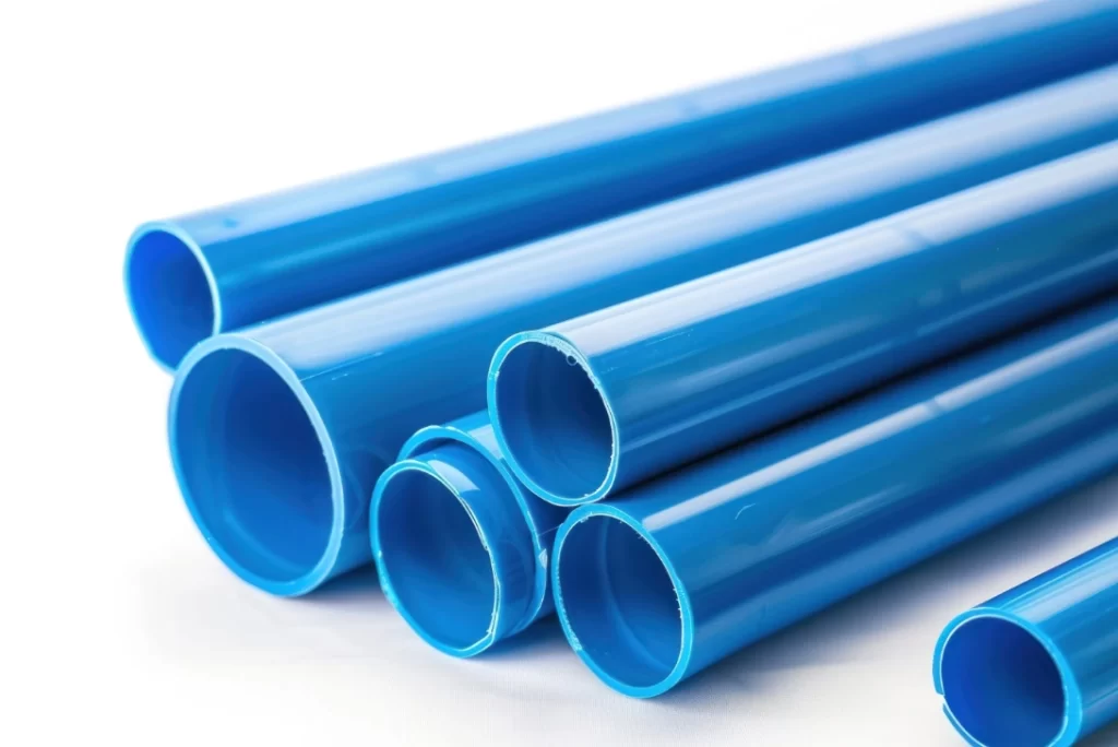 Several blue plastic pipes of uniform cross-sections