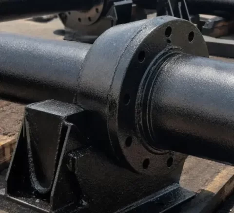 Alkyd-coated black metal axle and flange assembly 