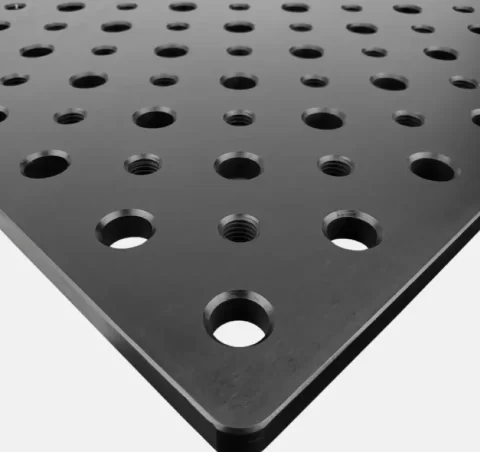 Modular fixture plate corner with reamed dowel holes and threaded mounting holes