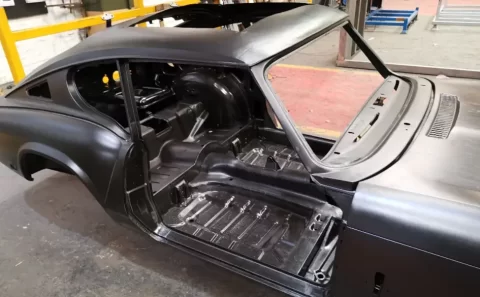 E-coated vehicle body shell, hatch open, primer finish 