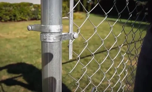 Galvanized steel farm fencing in an outdoor agricultural setting