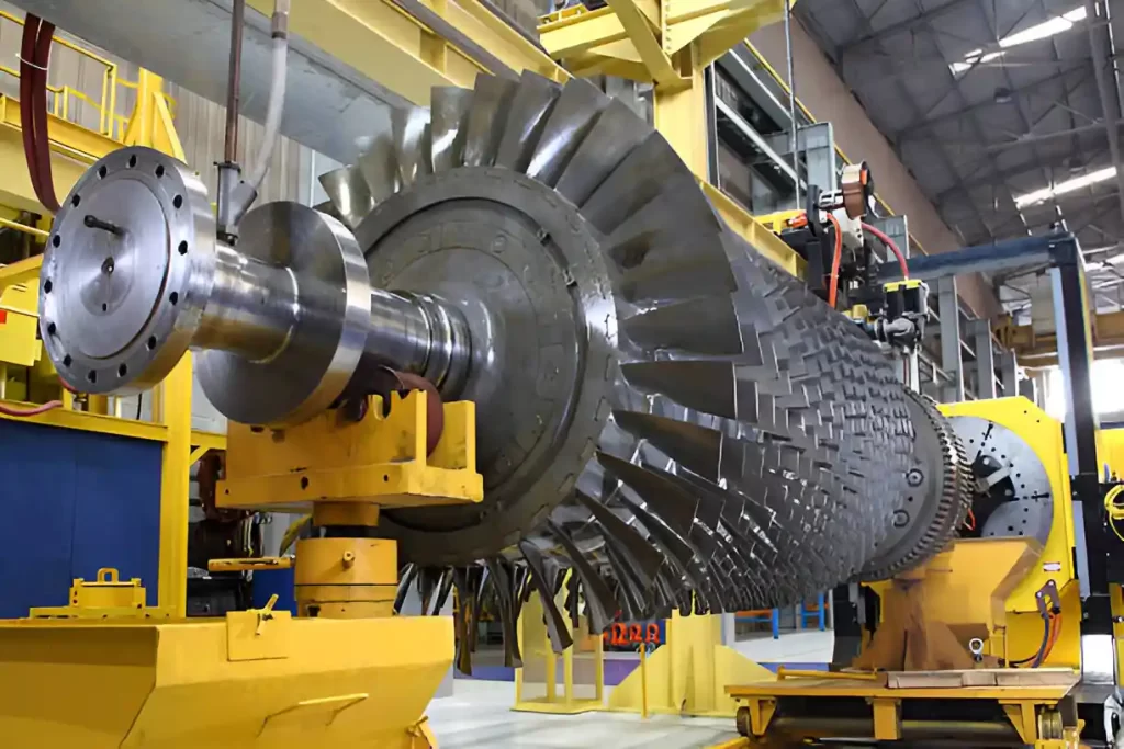 CNC-machined gas turbine rotor in an industrial workshop.