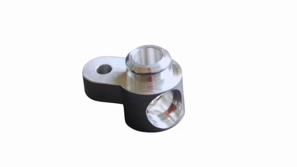 Finished 6063 aluminum part used in automotive assembly with a smooth surface finish.