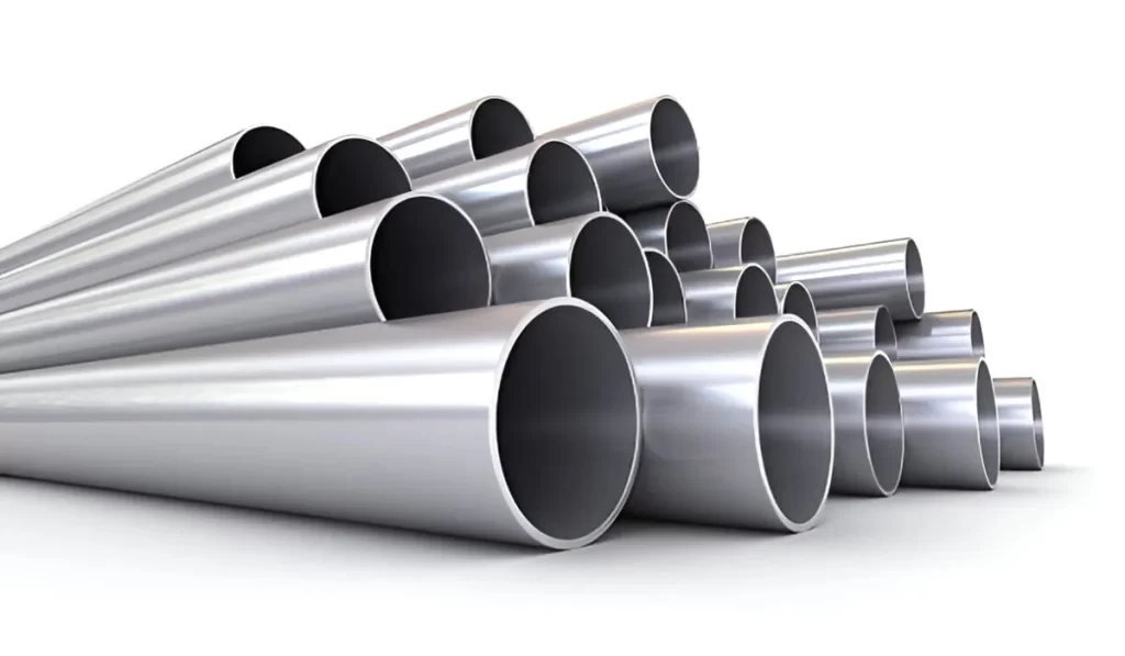 Stainless steel pipes are displayed against a plain white background. The pipes are arranged to showcase their smooth, reflective surfaces.