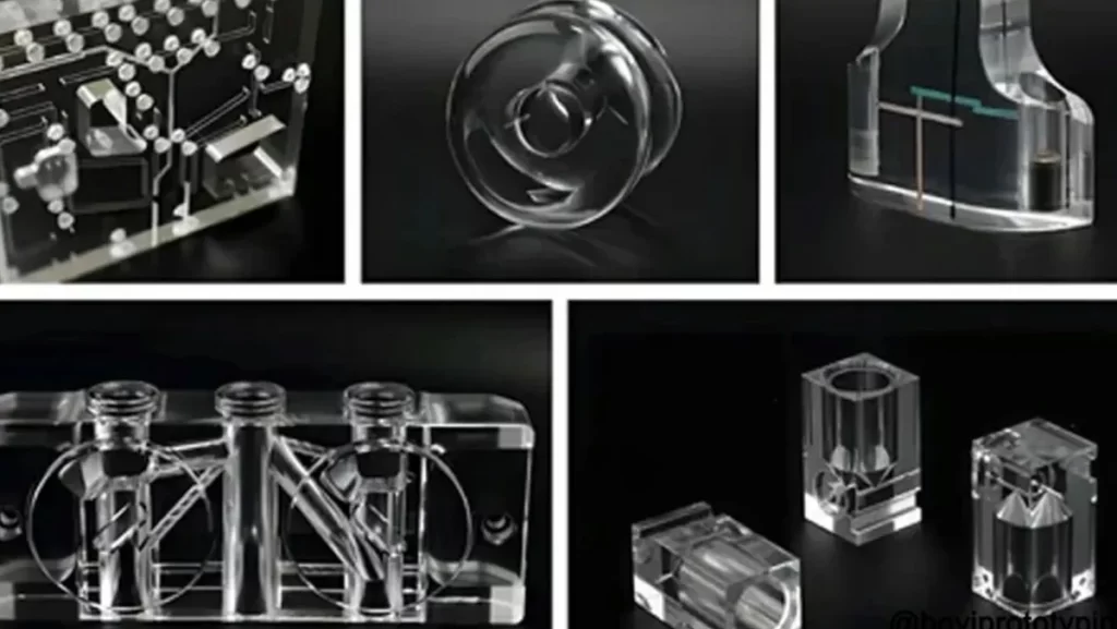 A close-up of clear, intricately machined polycarbonate parts