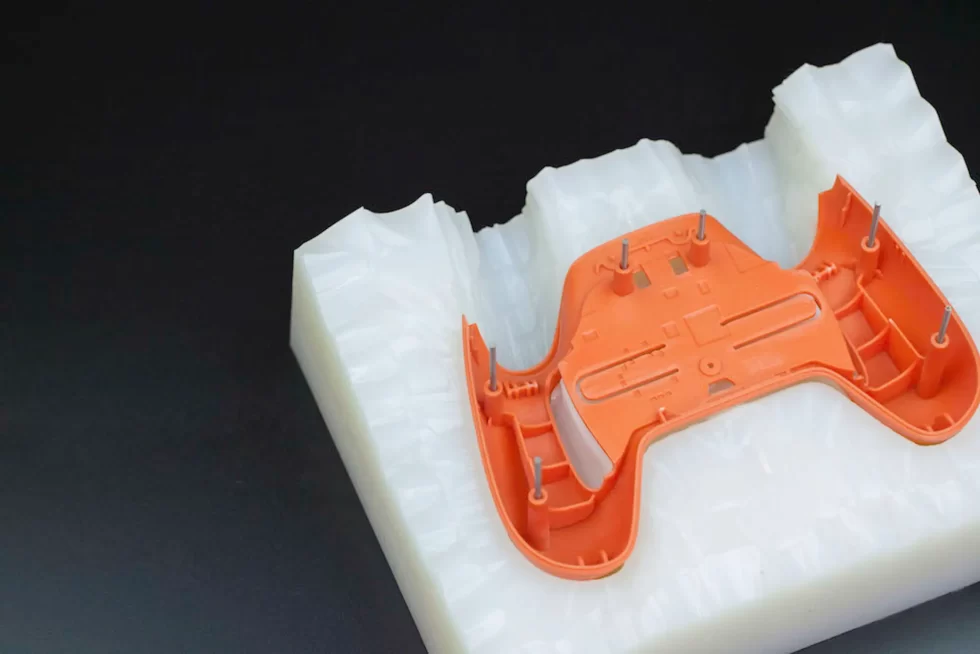 A prototype part is made using a vacuum-cast master mold.