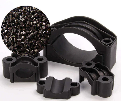 ABS plastic pellets and molded automotive clamps and brackets in black