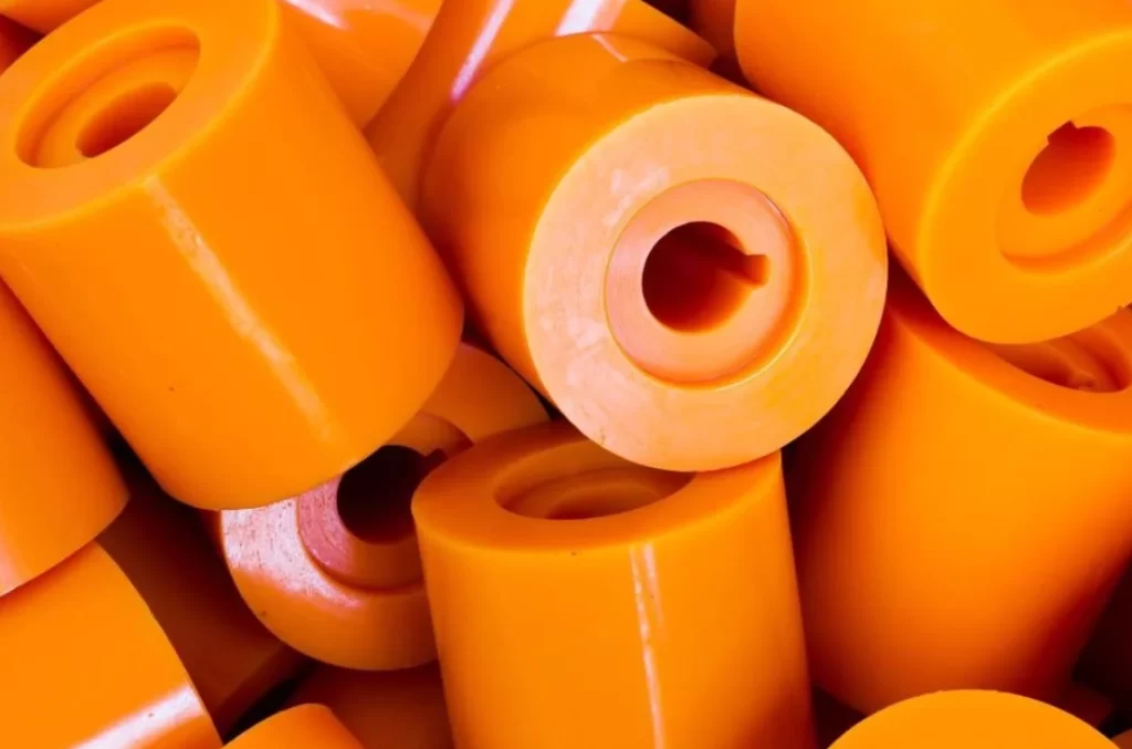 Orange polyurethane bushings and cylindrical thermoset components