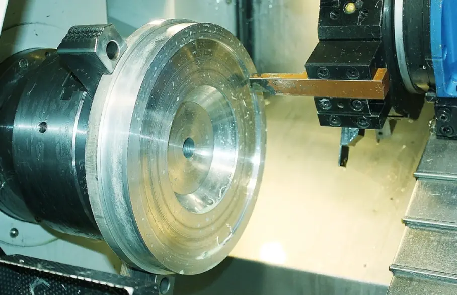 An image of a CNC turning process for a flywheel