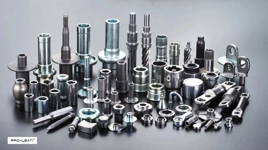 Many different shapes of shiny forged aluminum parts.