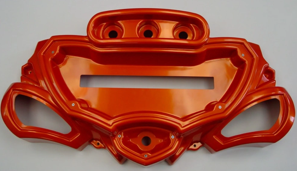 A red thermoformed polystyrene part for a gaming component