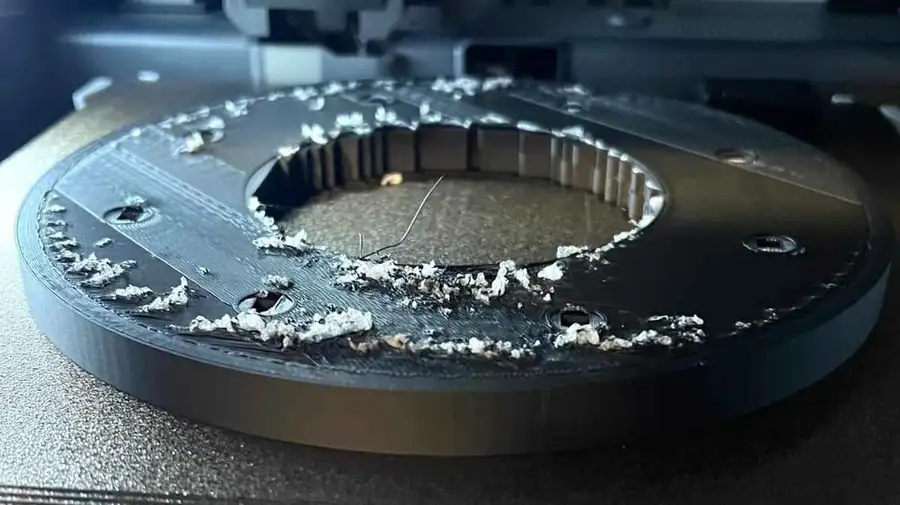 The image shows the PLA peel-off issue, with visible separation of layers