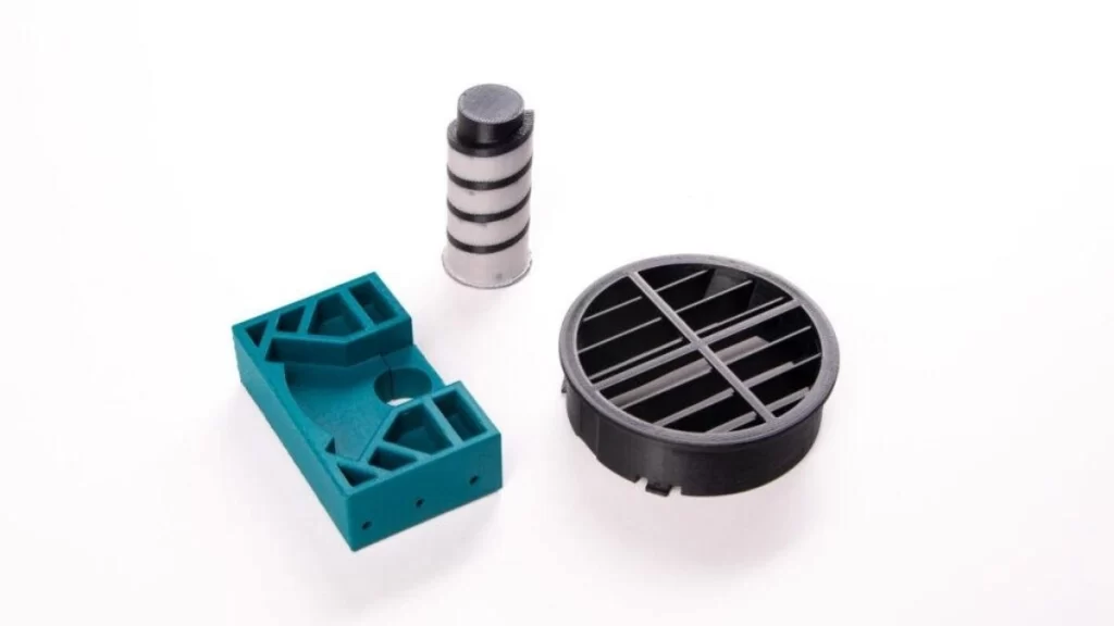 3D printed prototypes made from ABS plastic. It showcases detailed and durable designs.