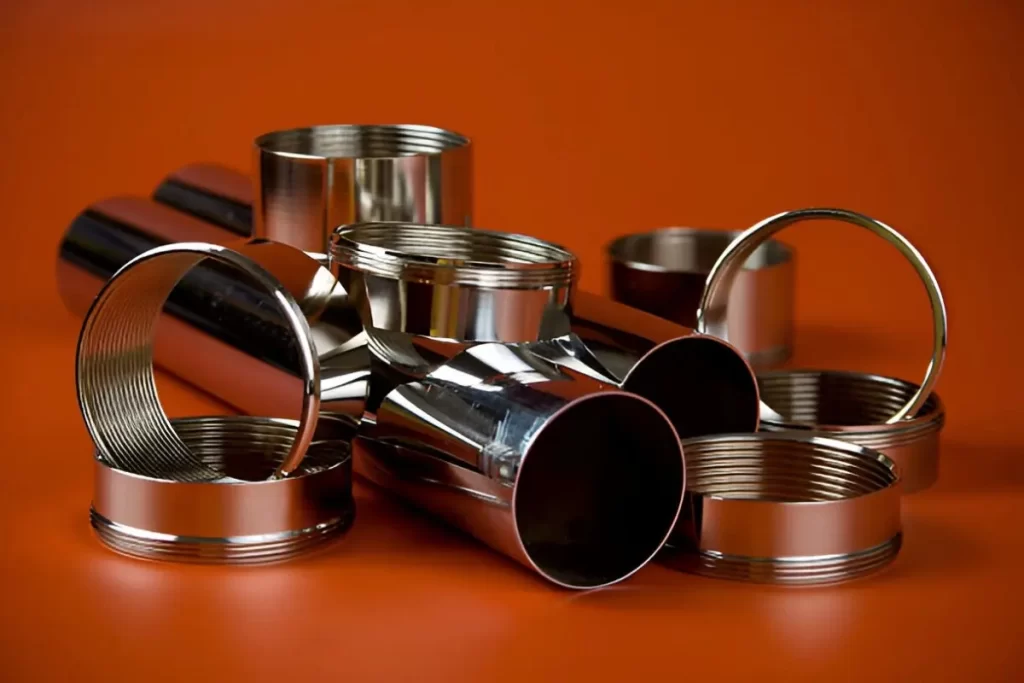 Metal parts with a shiny and smooth finish are neatly displayed. The surface looks clean and polished.