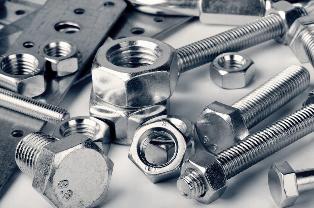 Shiny nut and bolts after thermal spraying finish
