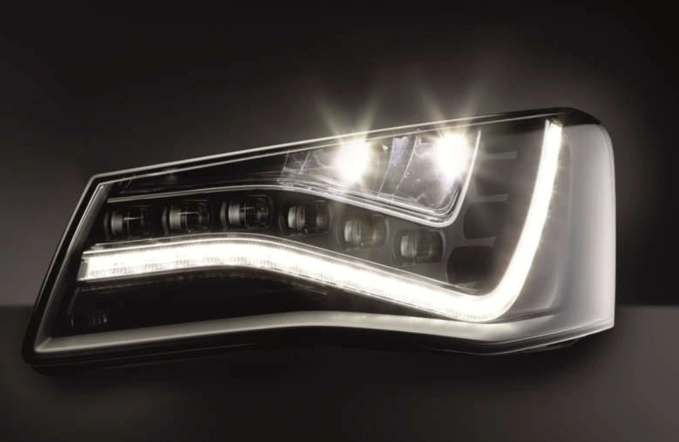 A closeup of a stylish and bright car LED headlight