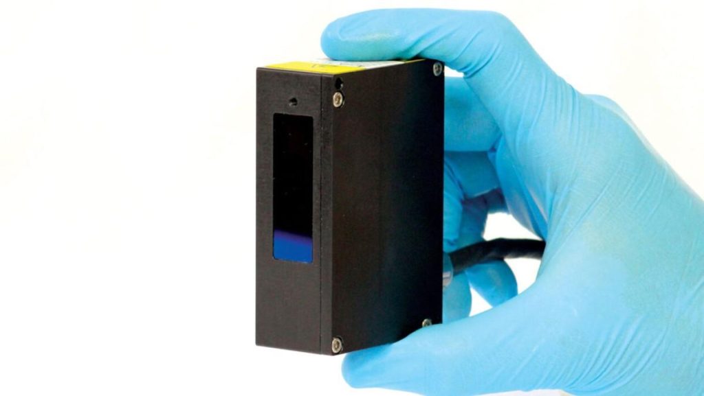 A black laser sensor.
