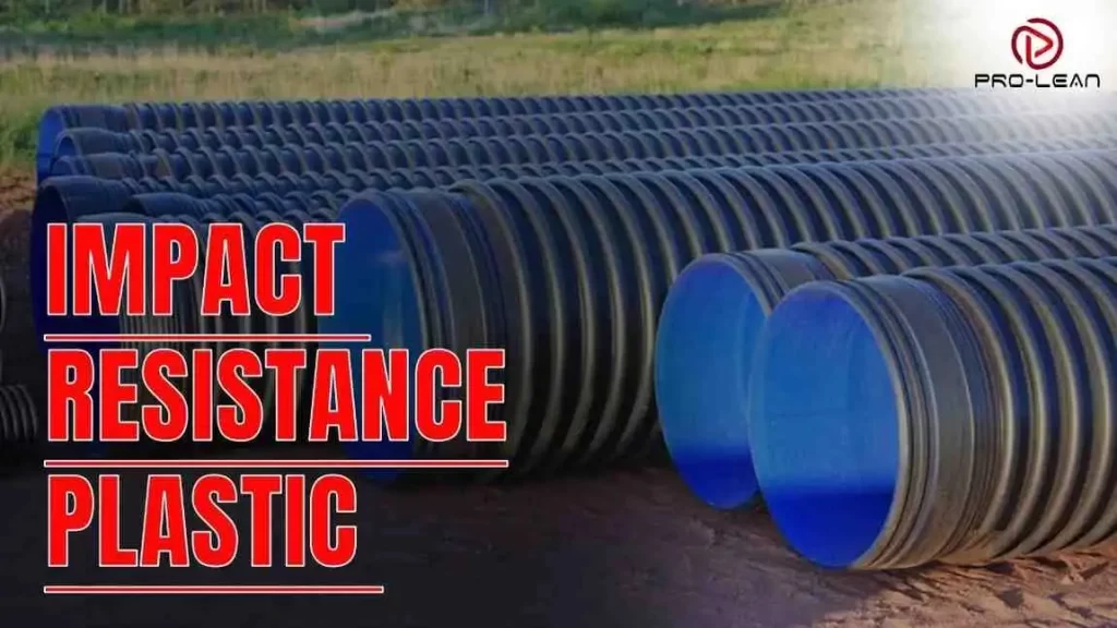 Stack of large, black corrugated plastic pipes