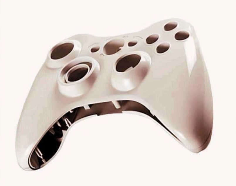 White injection-molded plastic prototype shell of a gaming controller.