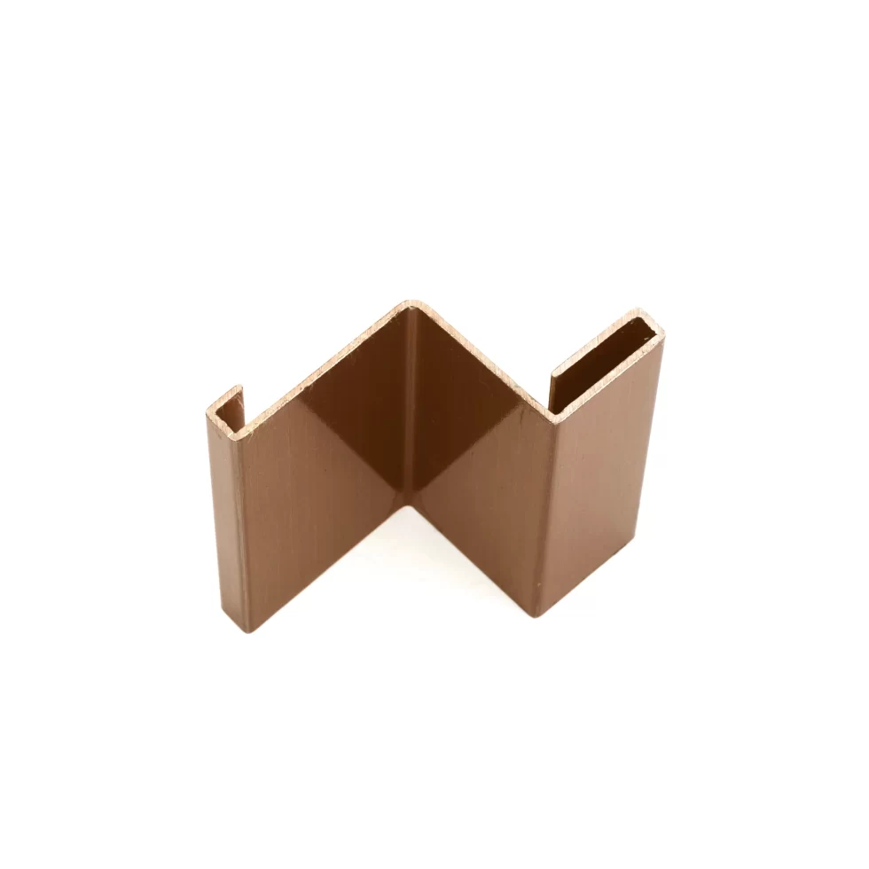 A fabricated metal part featuring precise groove lines along its surface.