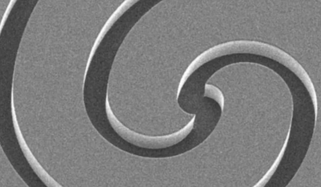 An image of a curved groove in a component formed by dry etching