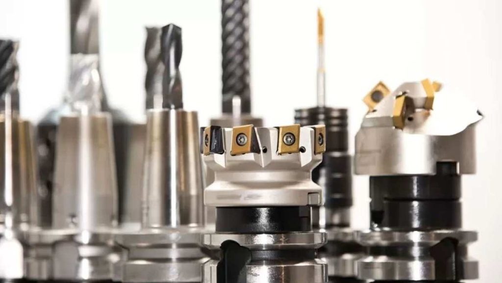 Close-up of various metal cutting tools.
