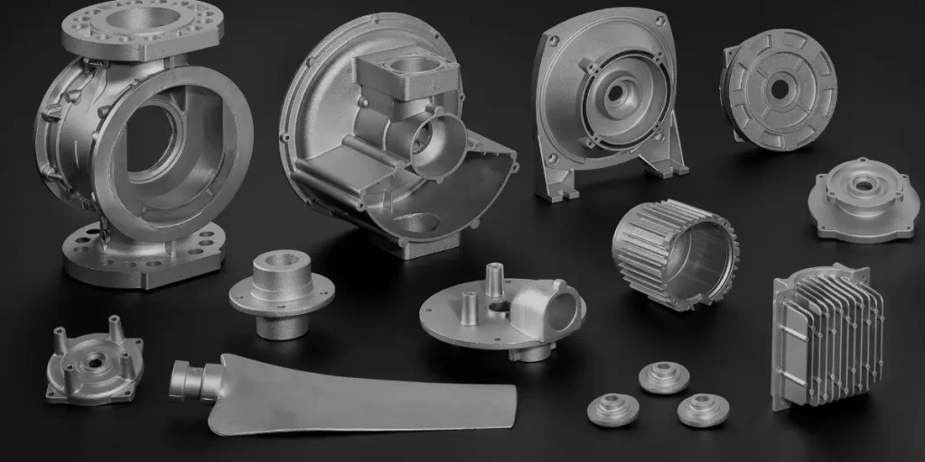 Alt Text: Collection of various aluminum steel parts with intricate shapes and designs
