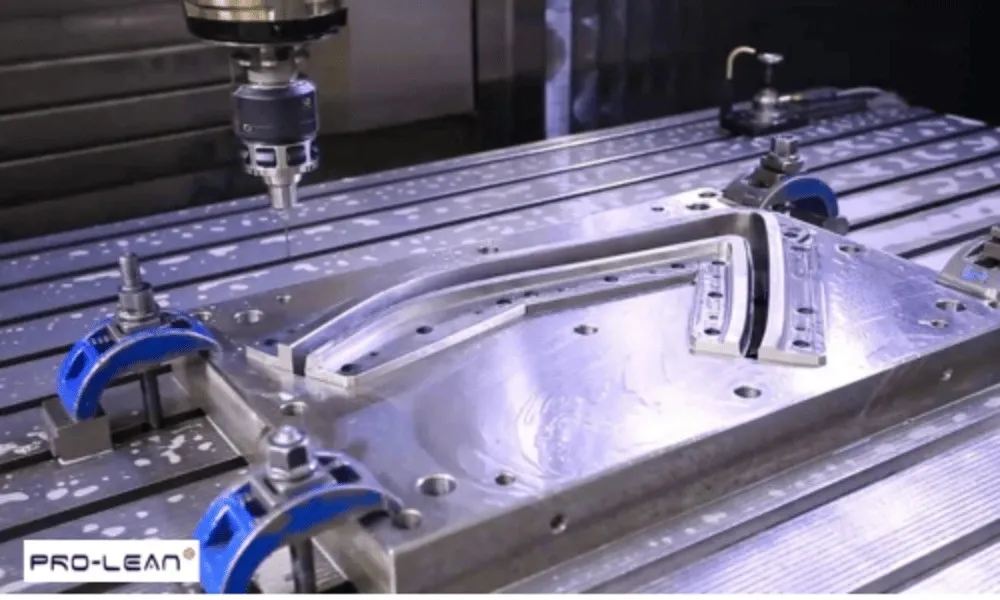 CNC milling machine precisely cutting a metal component with advanced manufacturing technology.