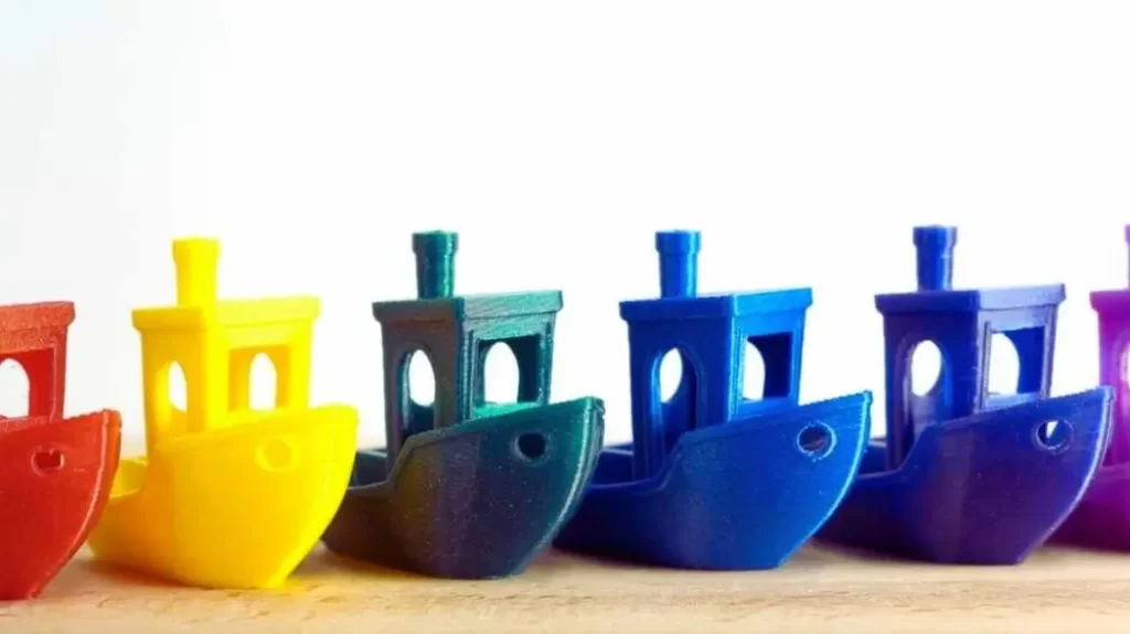 An image displaying ABS 3D-printed toys in vibrant colors