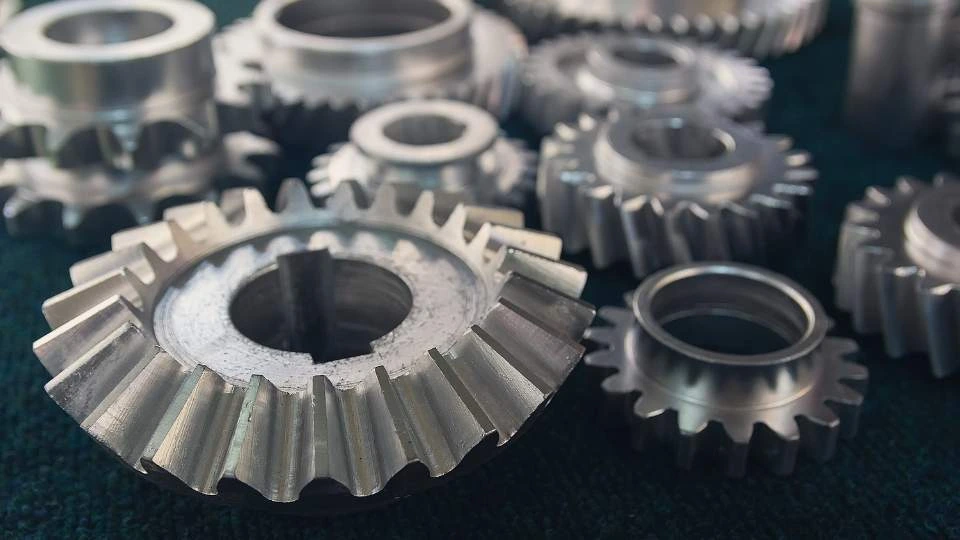 An image showing aerospace die-cast parts with sharp angles and defined edges.