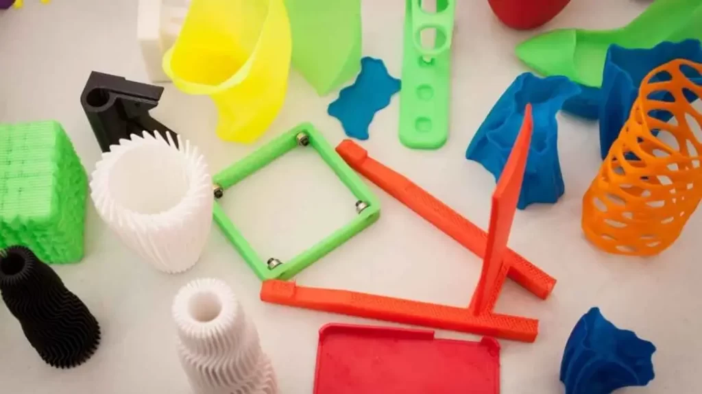 Custom PLA products are displayed in various colors and unique shapes