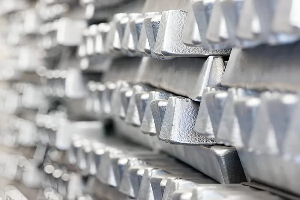 Raw aluminum metal block before processing.
