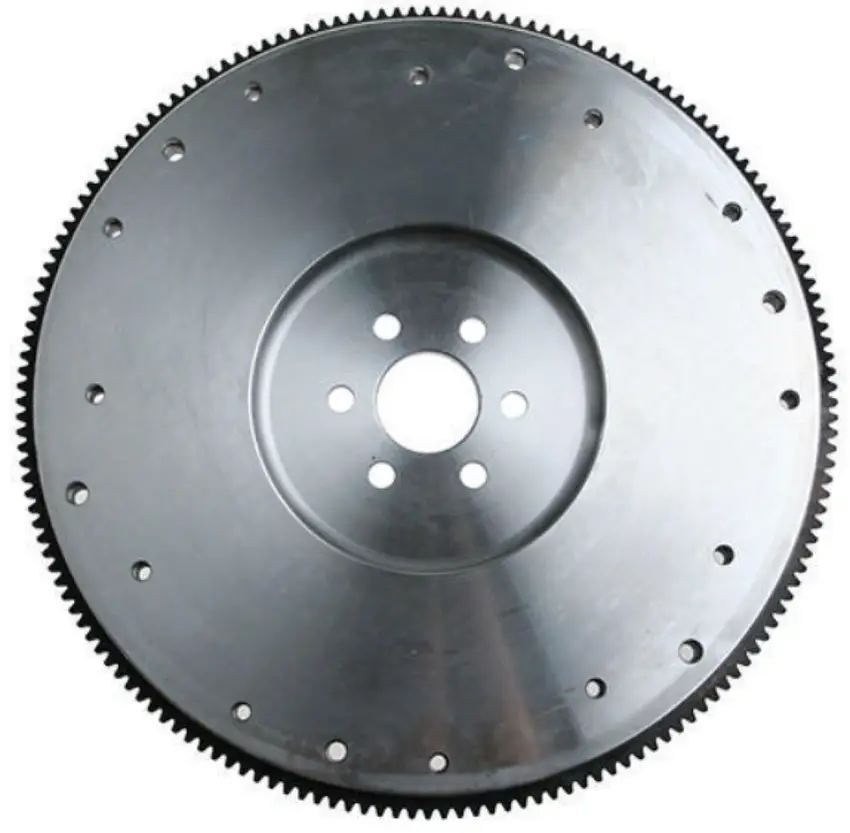 A smooth CNC-machined cast iron flywheel with multiple holes and a toothed peripheral ring