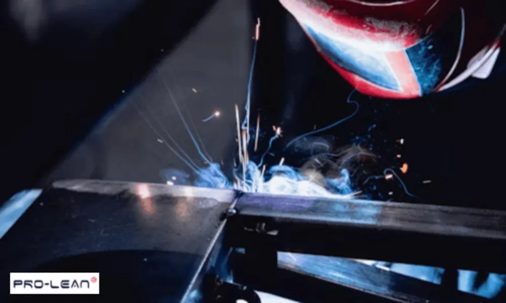 Close-up of welding sparks on metal, joining automotive steel parts.